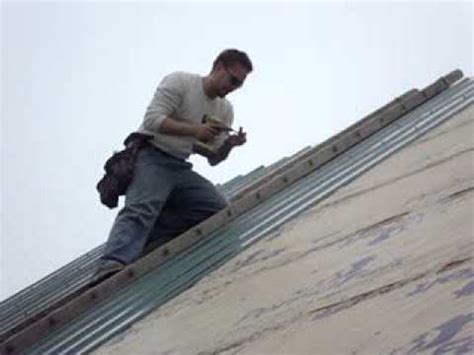 working on a steep metal roof